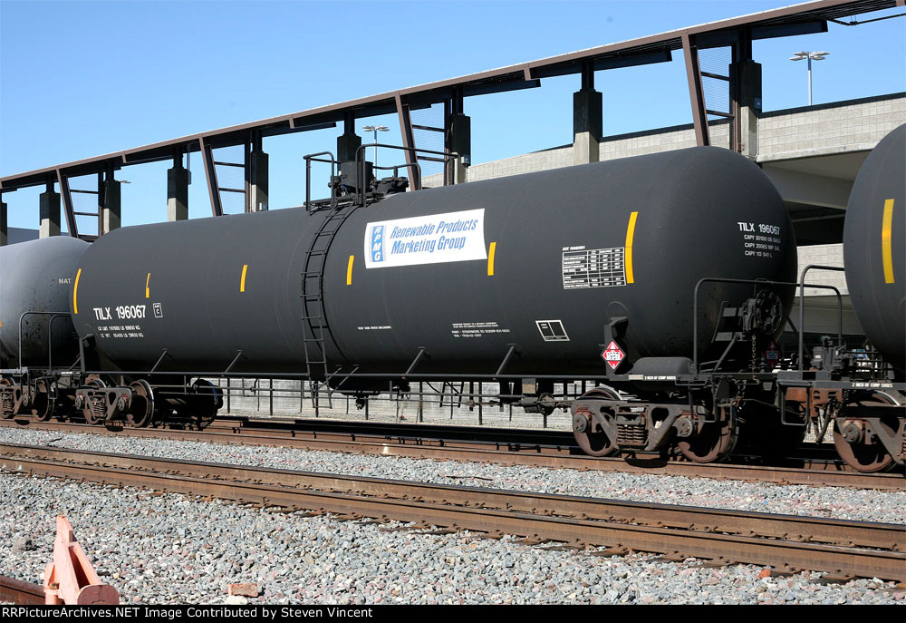 30K ethanol tank TILX 196067 in empty unit train eastbound.